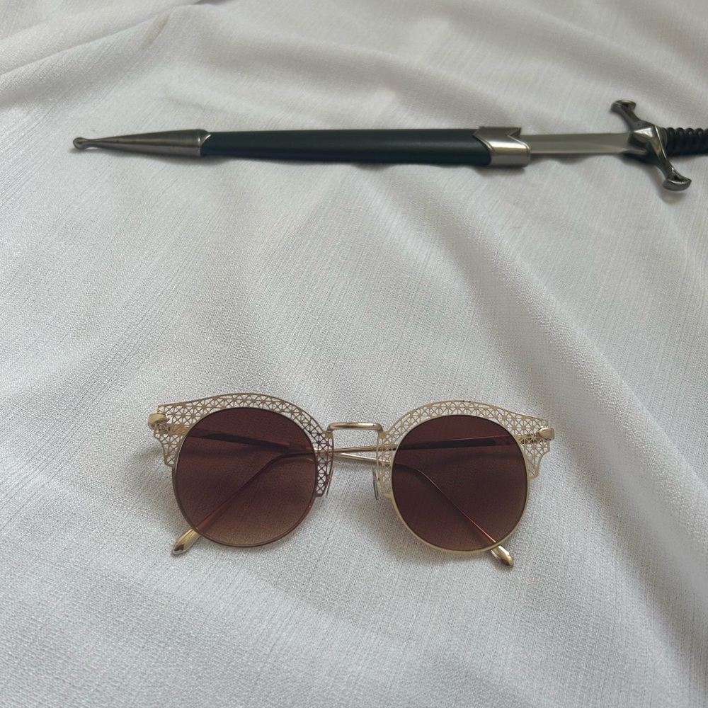 Beautiful brown with golden rim sunglasses